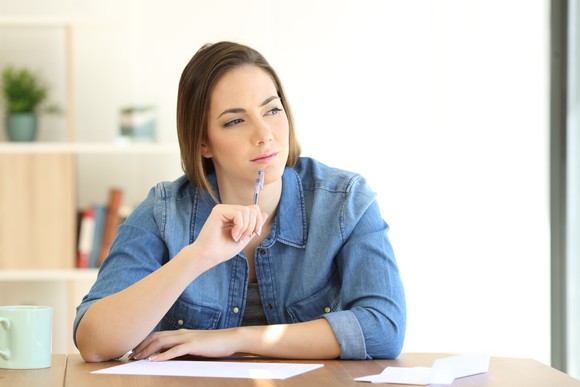 A young woman in deep thought.