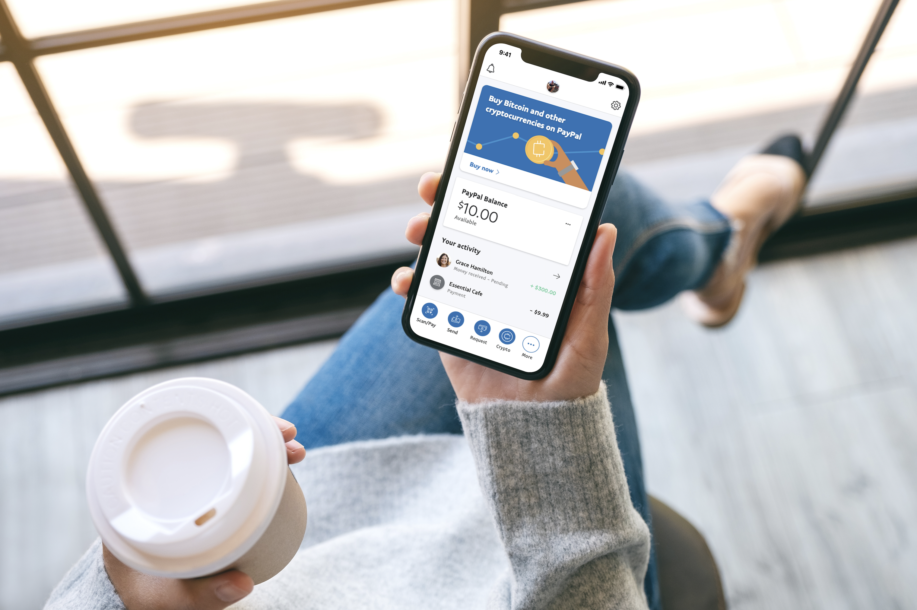 A smartphone with the PayPal app displayed.