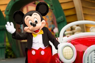 Mickey waves hello as Disneyland reopens