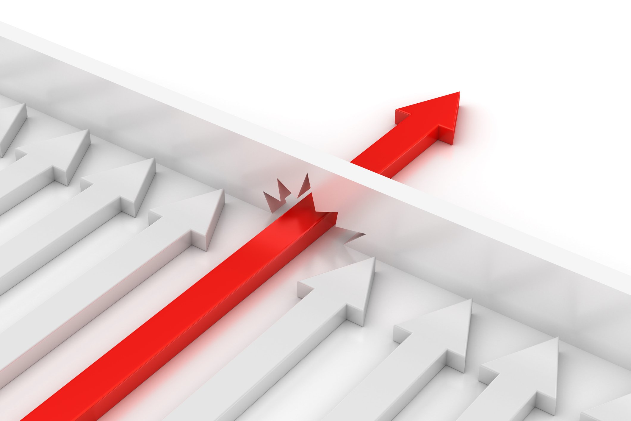 A red arrow breaks through a barrier that stopped multiple white arrows.