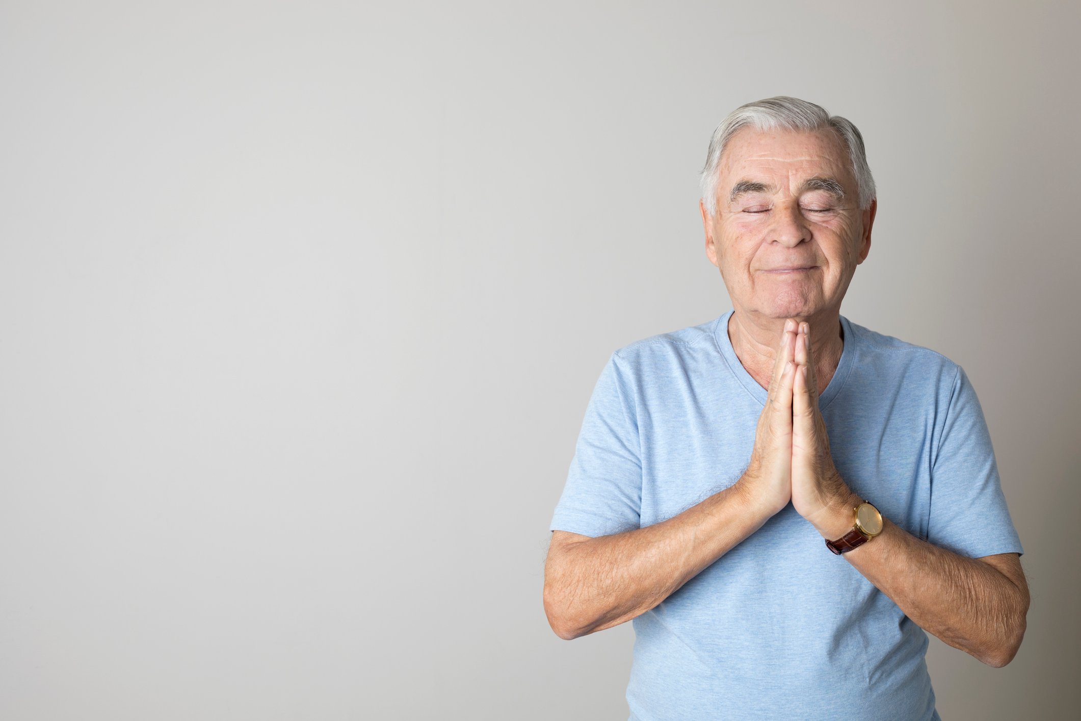 Retired man in peaceful meditation