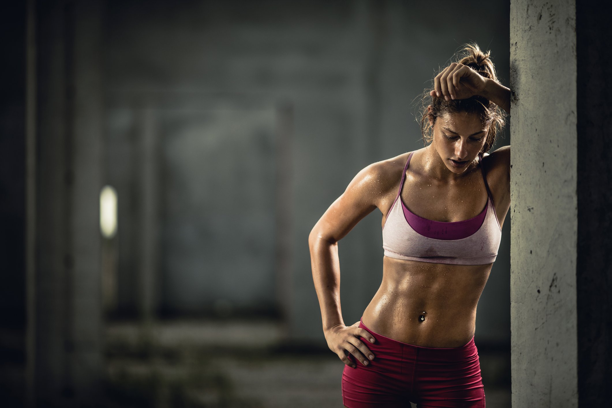 Young woman exhausted after a workout.