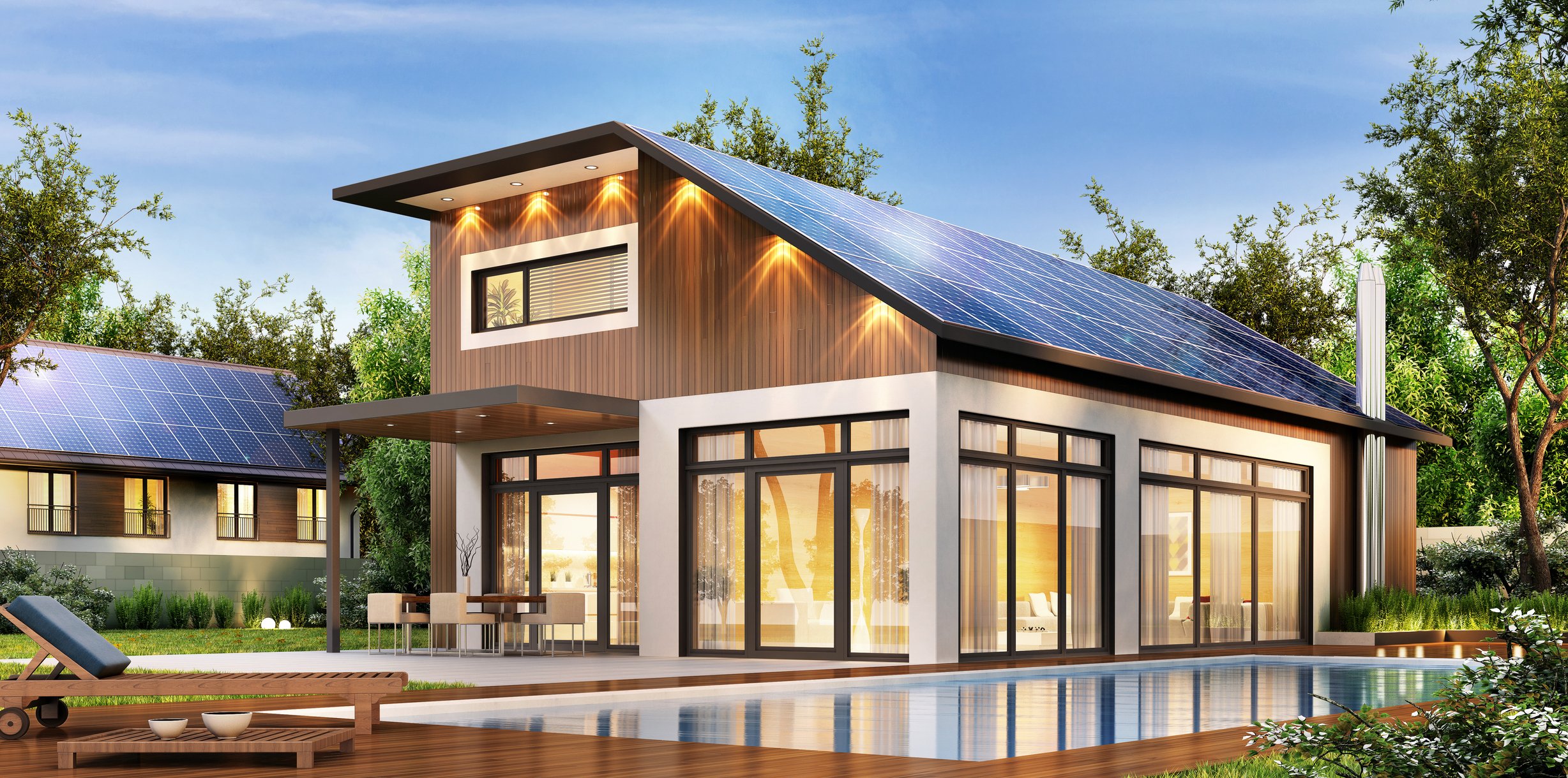 Large modern house with solar panels on the roof.