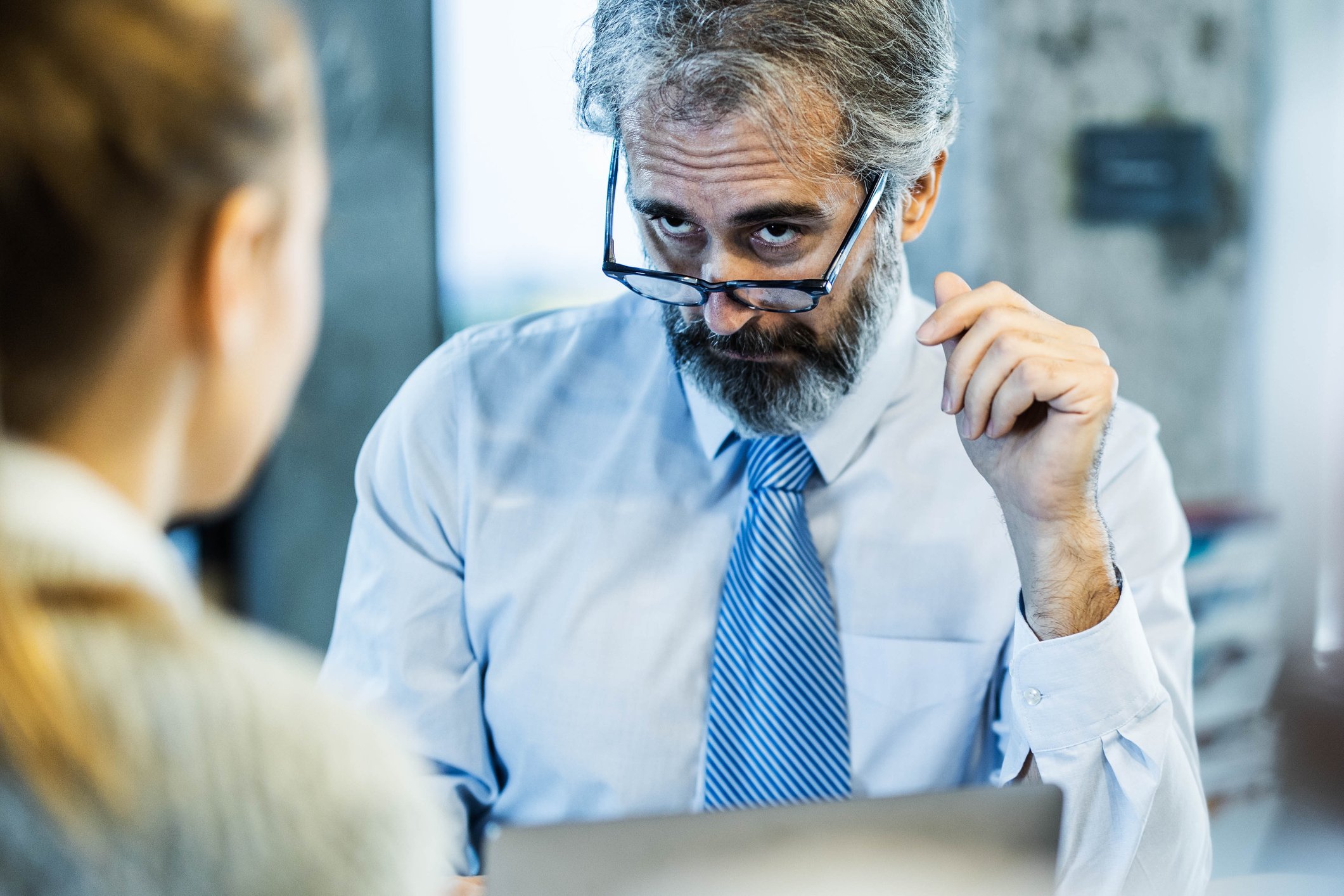 An aging analyst gives his client a stern look.