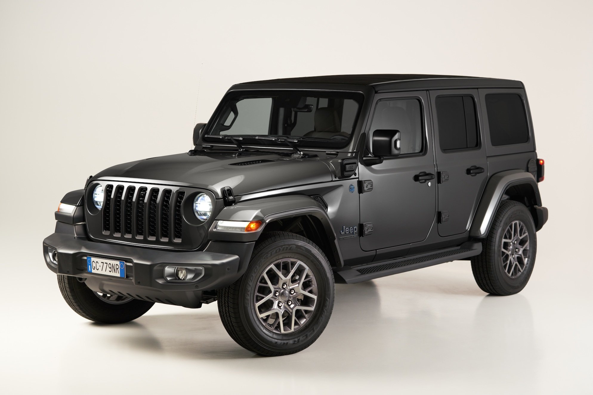 A European-market Jeep Wrangler on display in a neutral space.