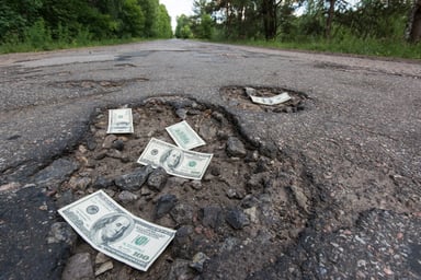 Potholes and money