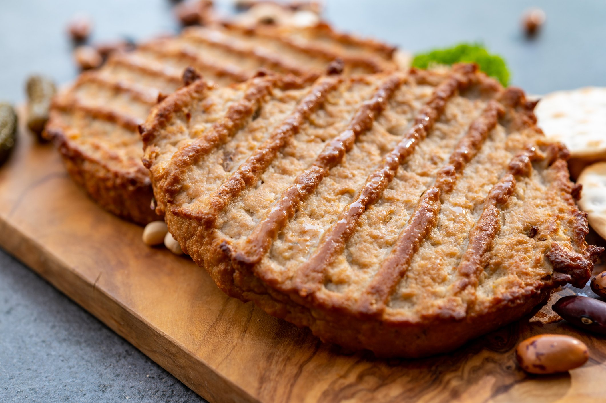Plant-based meatless patties on a cutting board