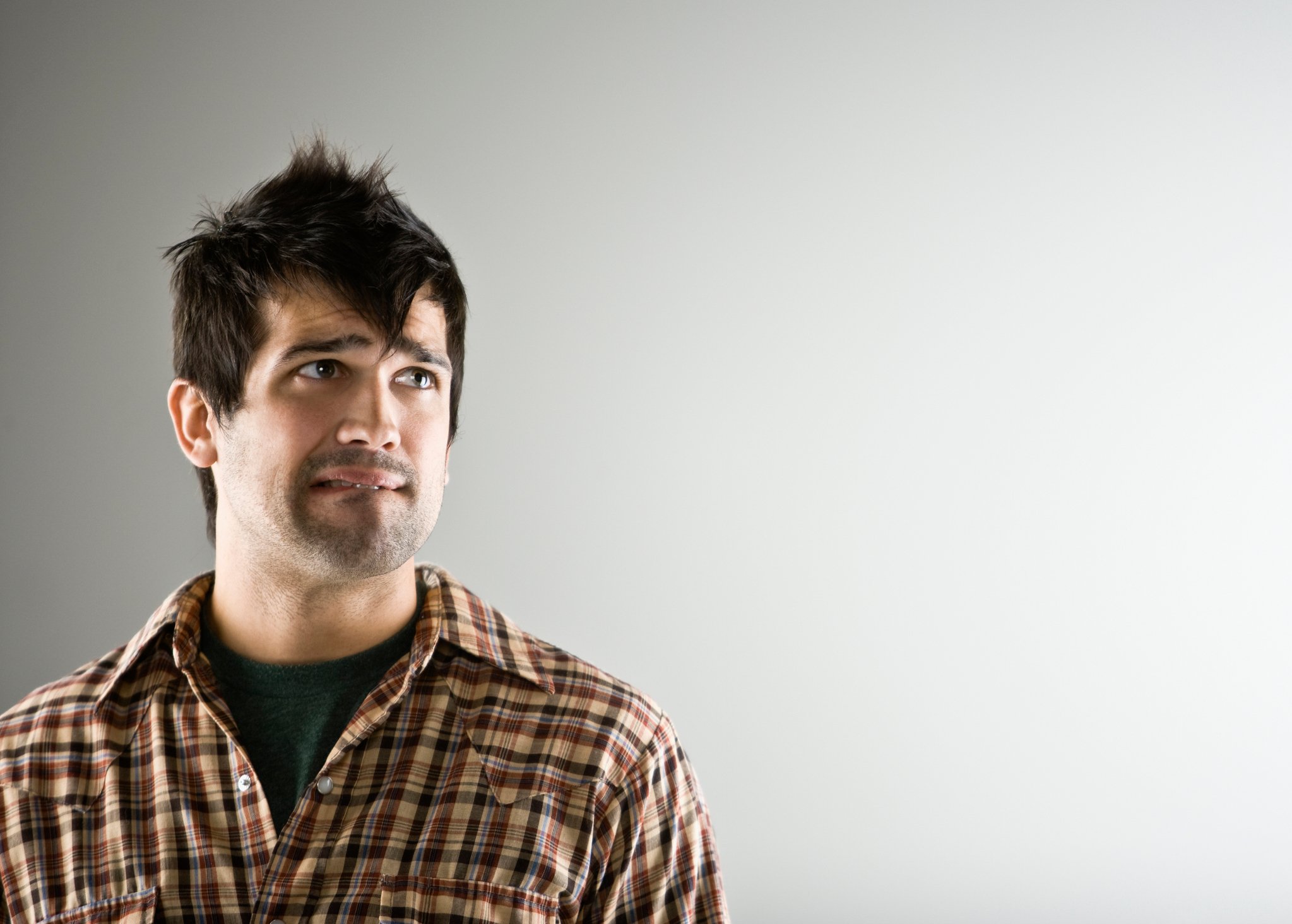 A man looking fearful.