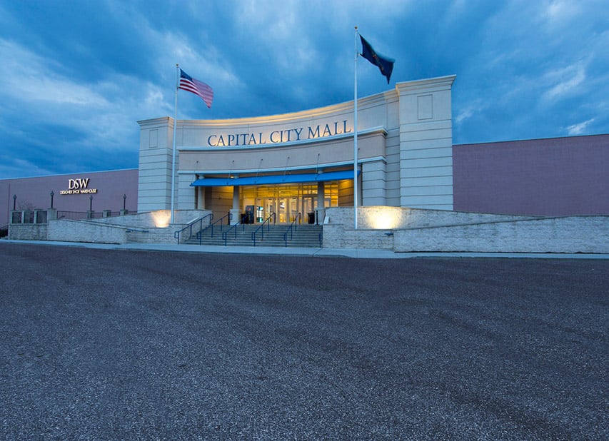 Flags flying in front of the main entrance to PREIT's Capital City Mall 