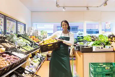 A woman working in a supermarket