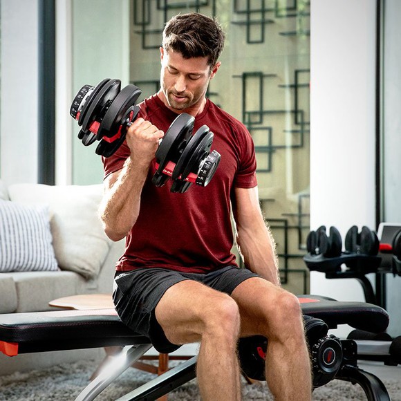 Man lifting dumbbells