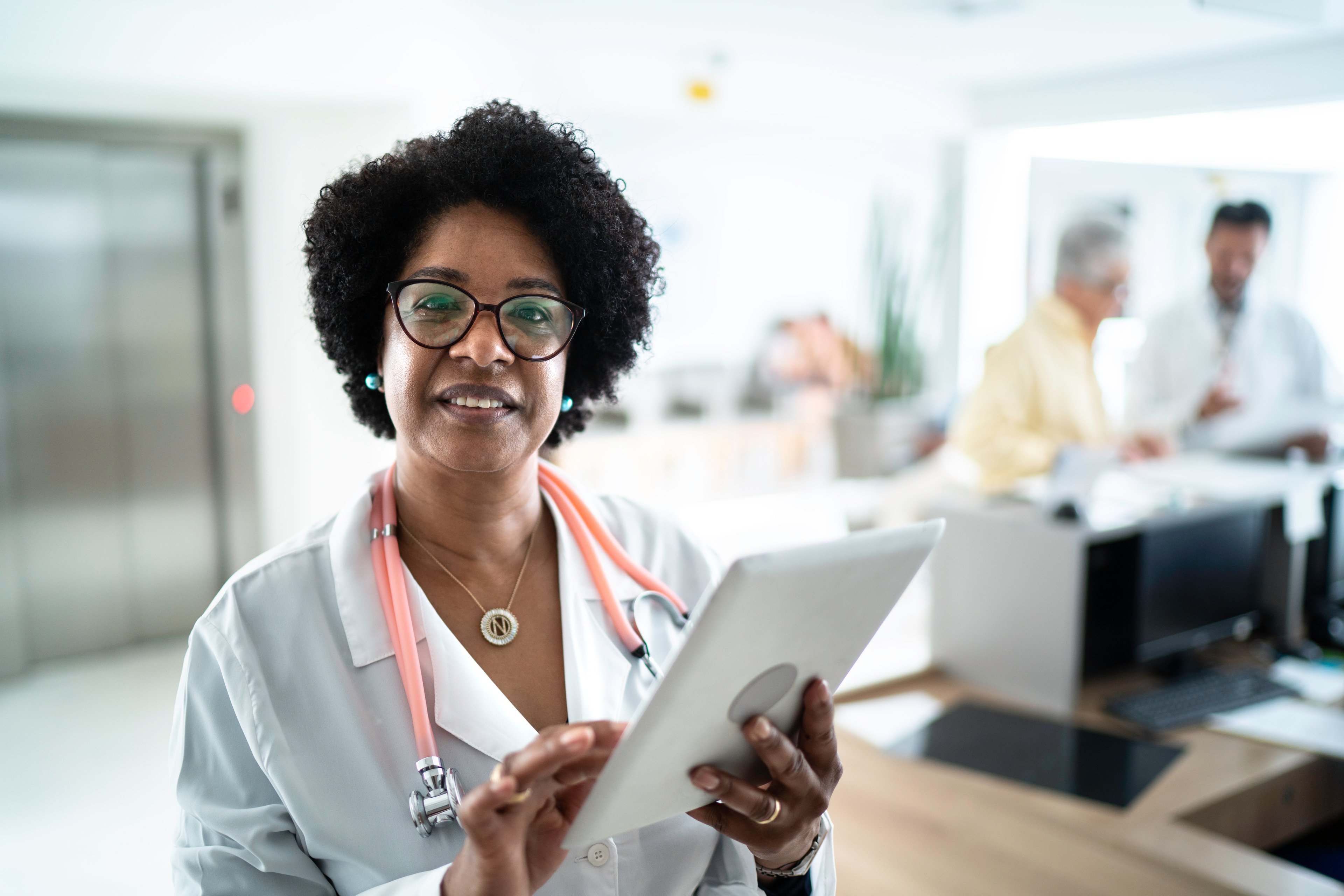woman doctor tablet