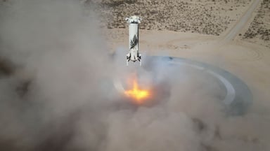 New Shepard Booster landing Blue Origin