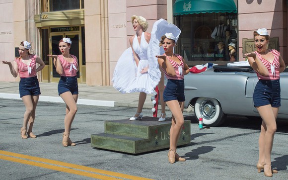 A street show at Universal Studios Florida with a Marilyn Monroe lookalike and retro dancers.