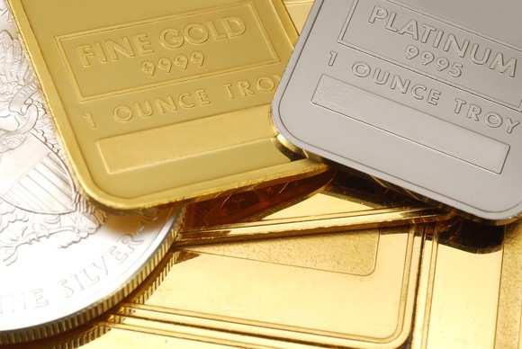 Gold and platinum bars side by side