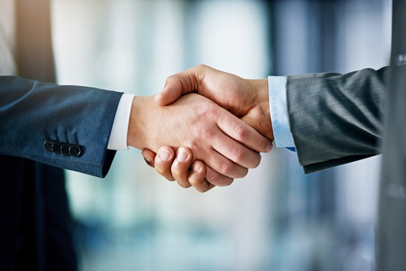 Closeup on a handshake between businessmen. 