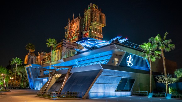 a building from the Disneyland Avengers campus is seen at night