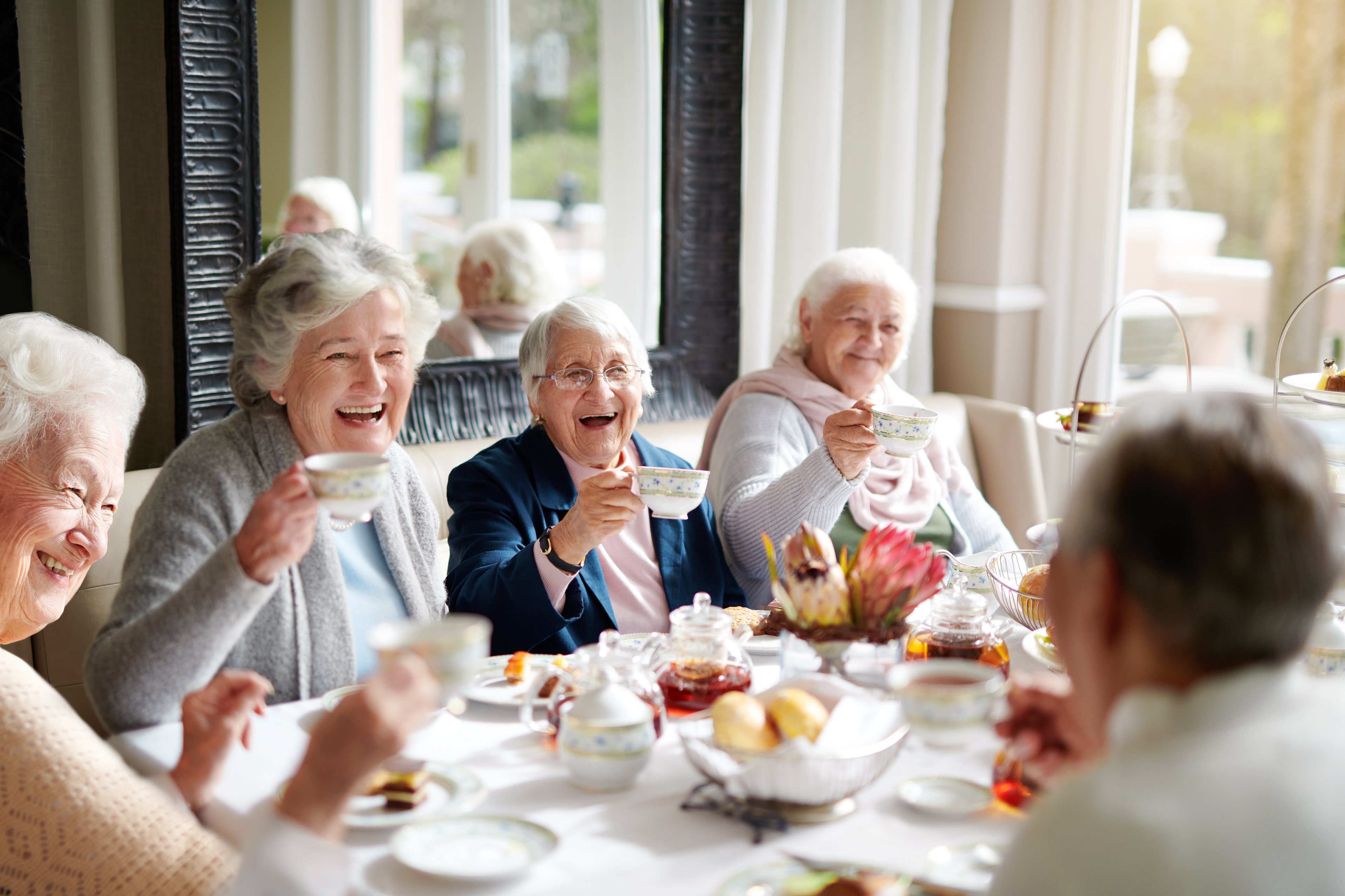 A group of people enjoy a meal together.