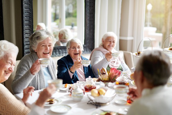 A group of people enjoy a meal together.