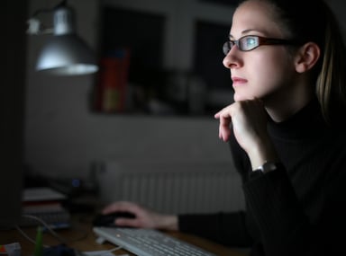 woman in front of a computer