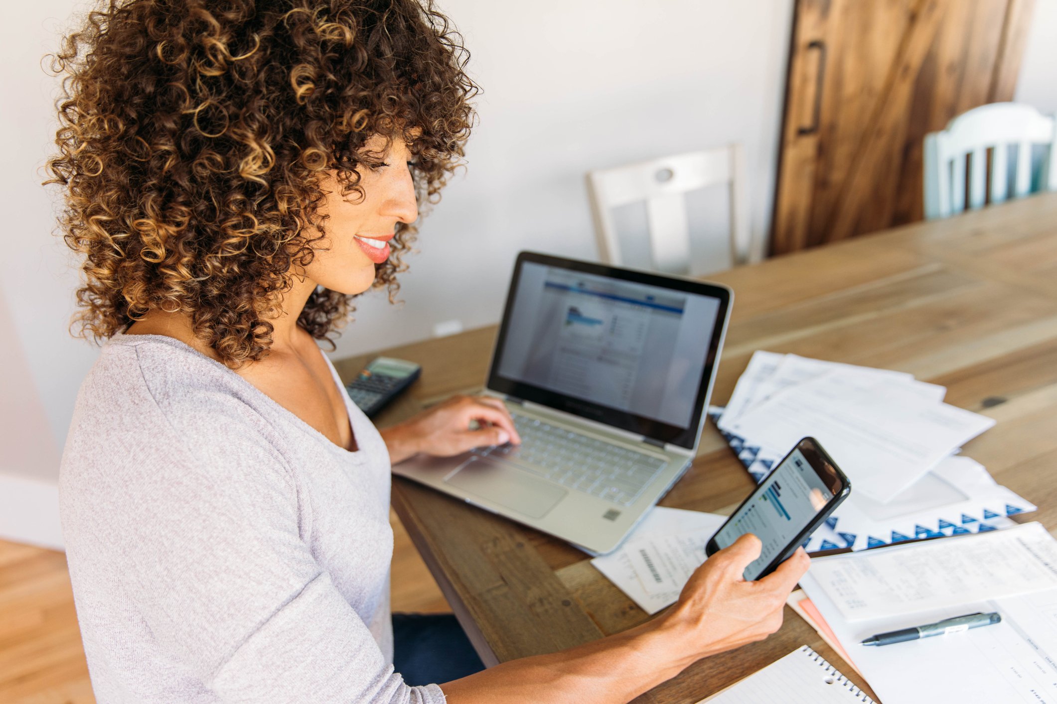 younger-woman-doing-finances