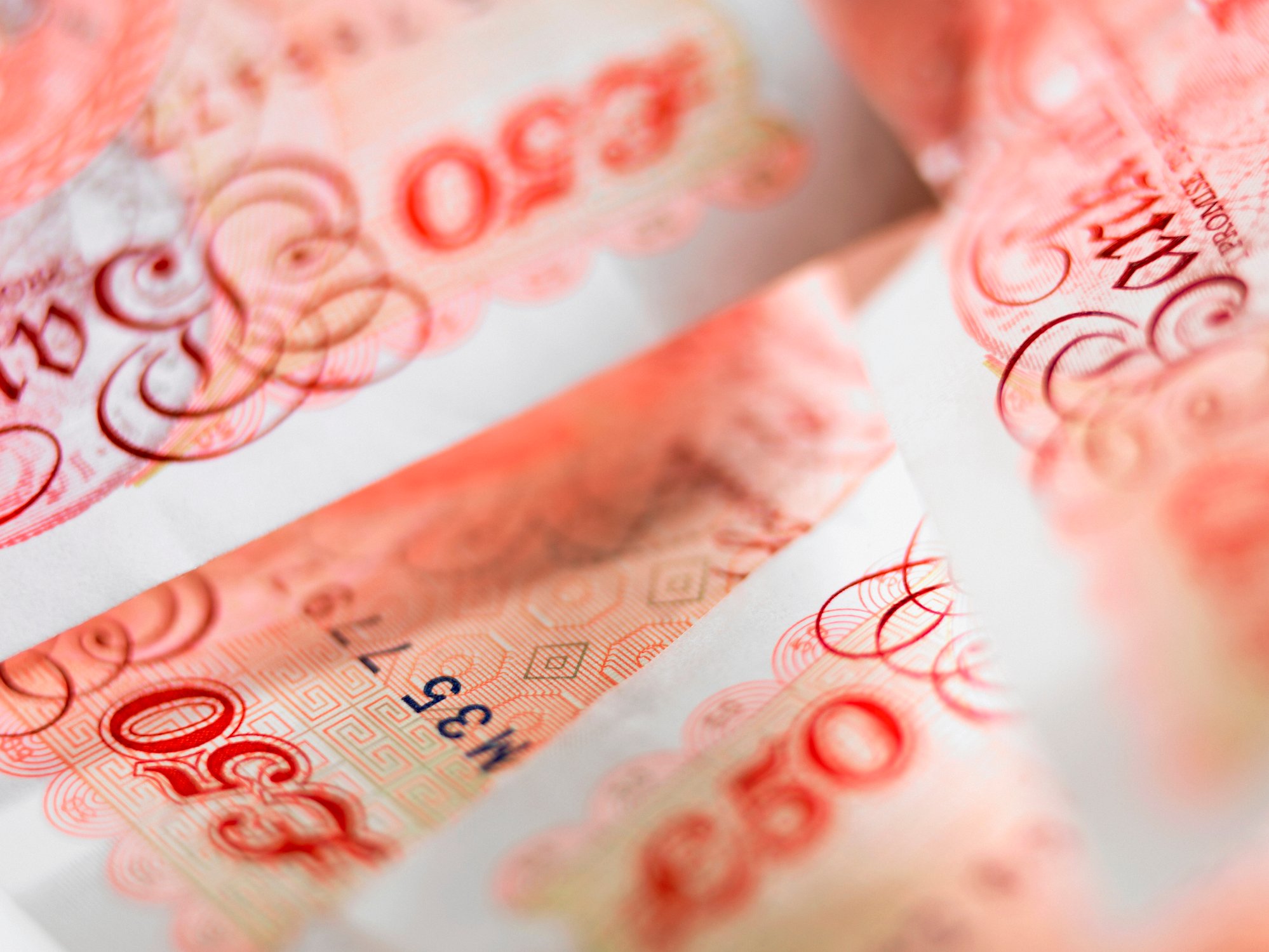 Closeup of British banknotes.