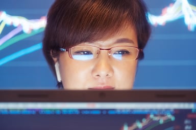 Stock charts with woman