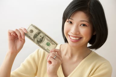 Woman with $100 bill