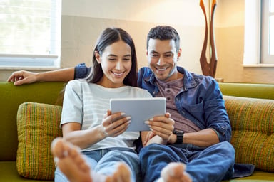 Couple looking at iPad
