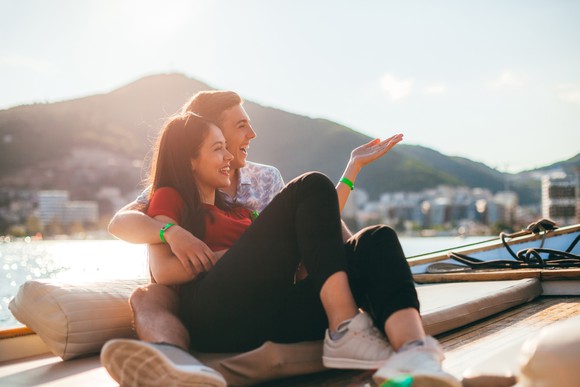 A young couple on a boat.