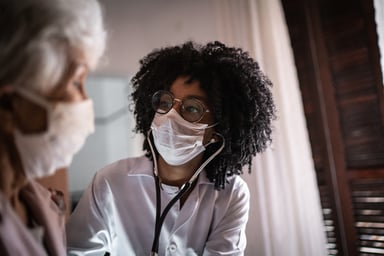 GettyImages-doctor examines senior patient
