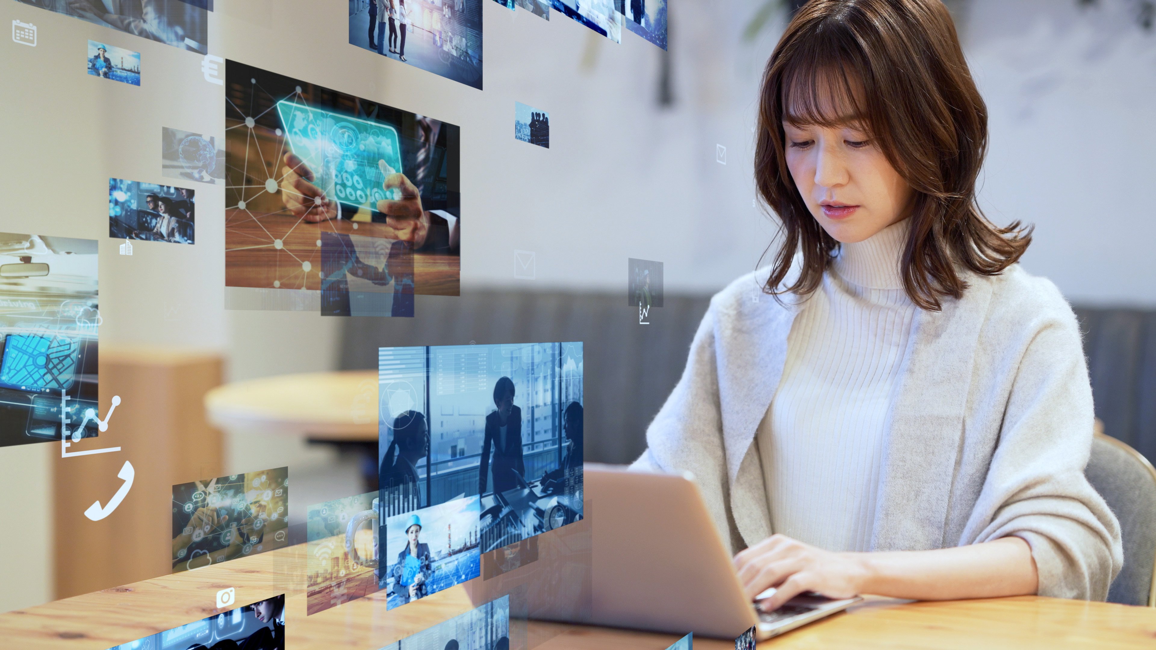 A person looking at a laptop.