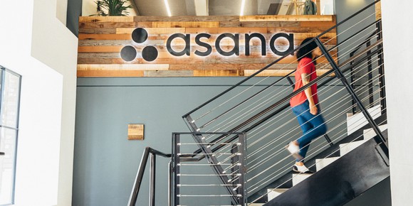 Person walking up stairs at Asana headquarters