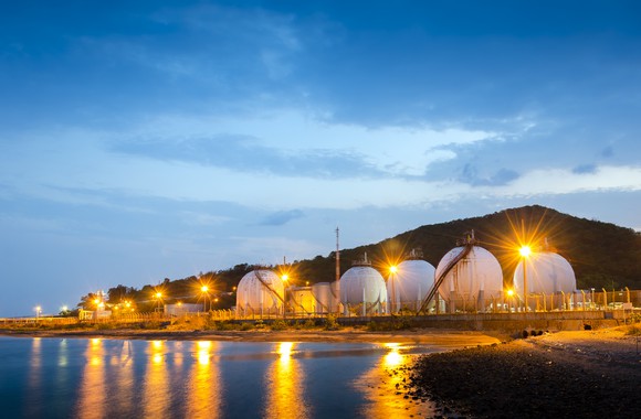 Pressured LNG tanks by the water.