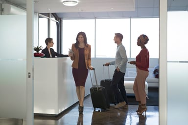 People checking into a hotel.