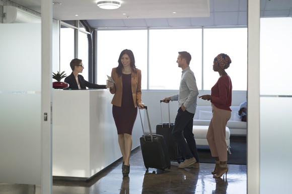 People checking into a hotel.