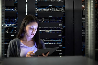 female engineer in server room 