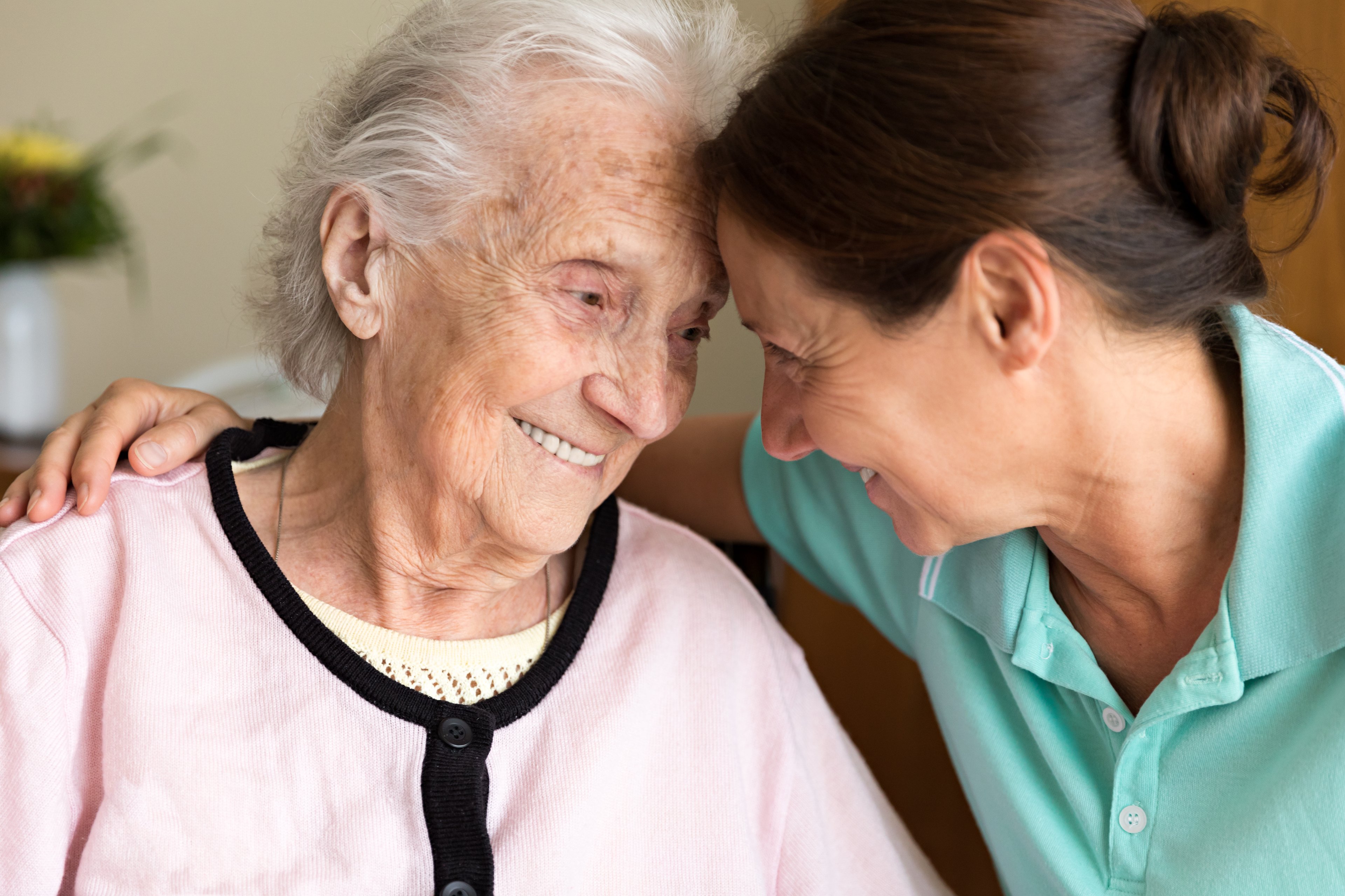 Caregiver helping patient with dementia. 