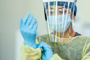 Person Putting on PPE