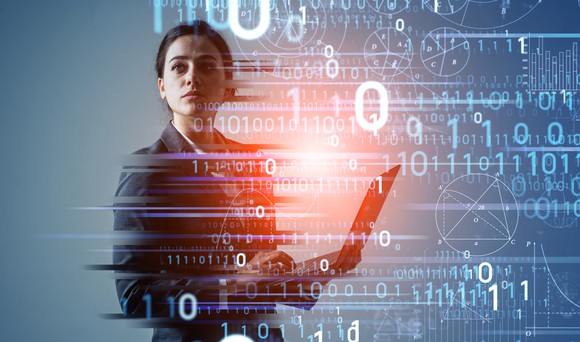 A person holding laptop, overlaid by strings of 1s and 0s, and geometric shapes.