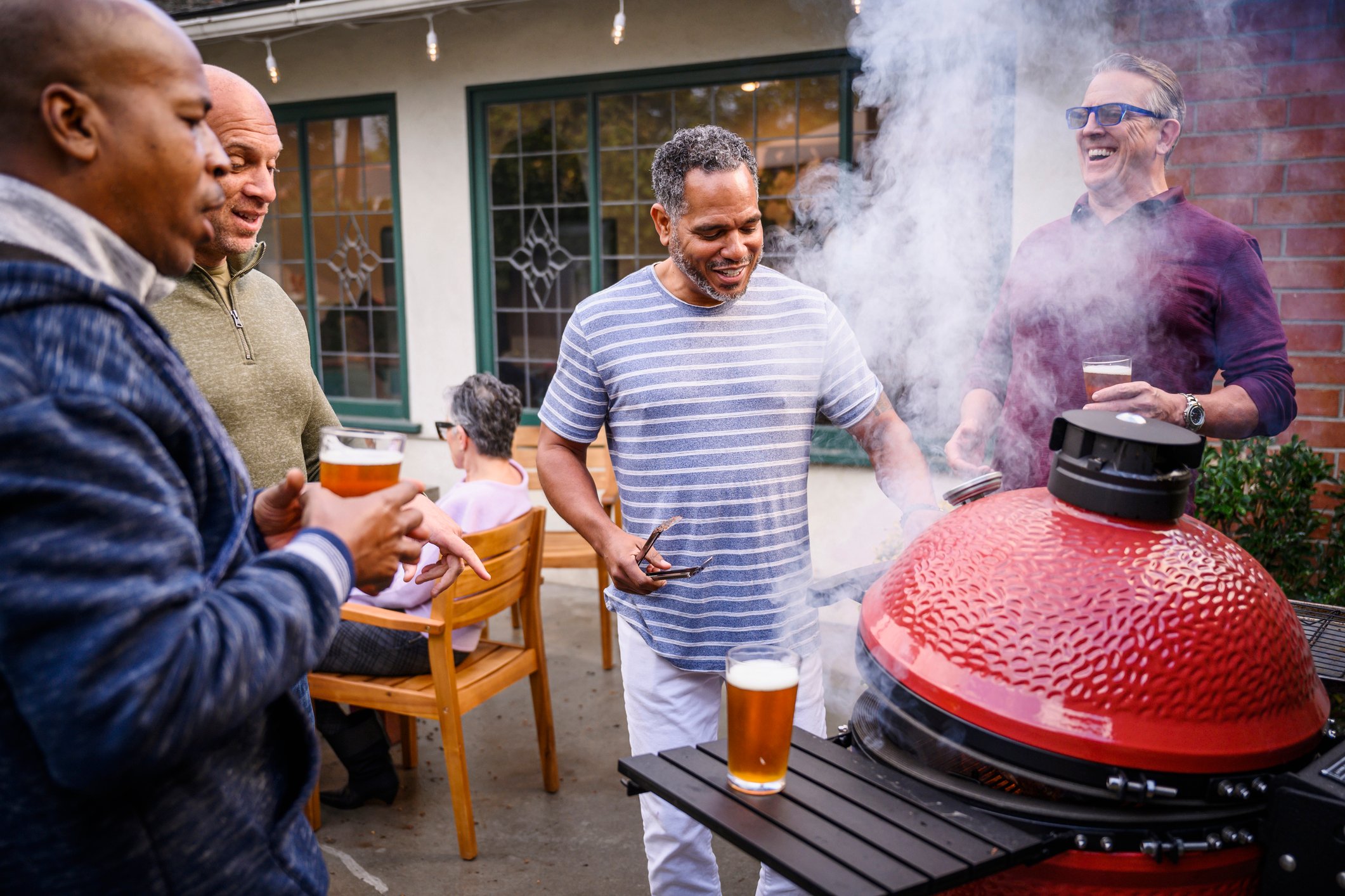Friends gathering at a summer cookout.
