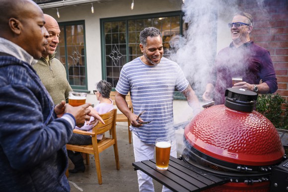 Friends gathering at a summer cookout.