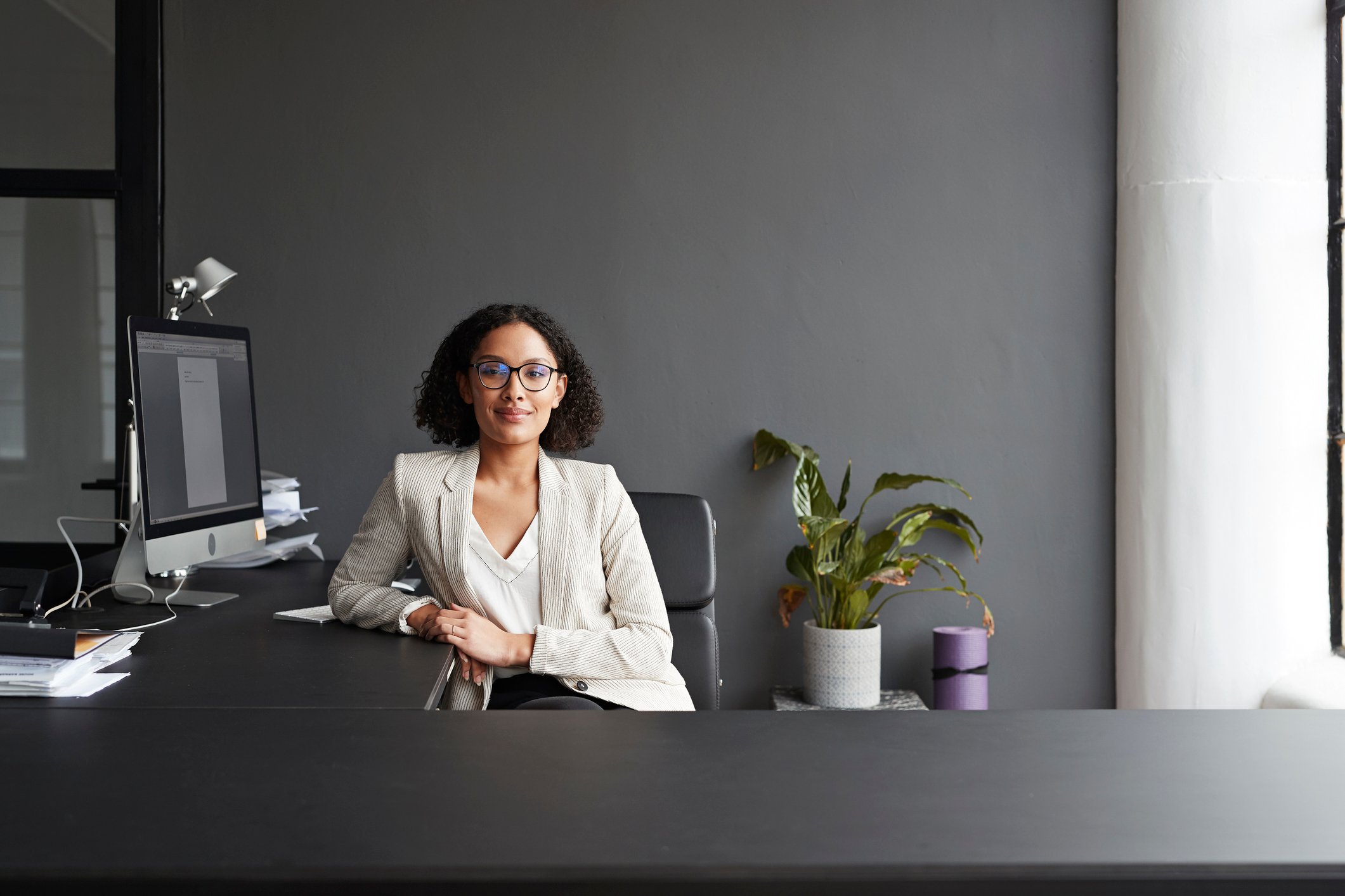 Smiling person at desk