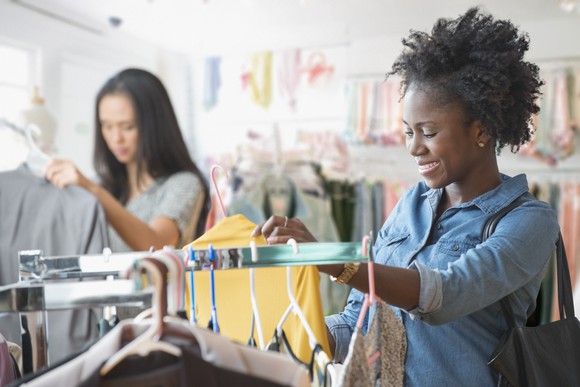 Two people shopping at a department store.