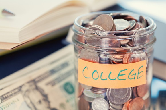 A glass jar used to accumulate college-savings.
