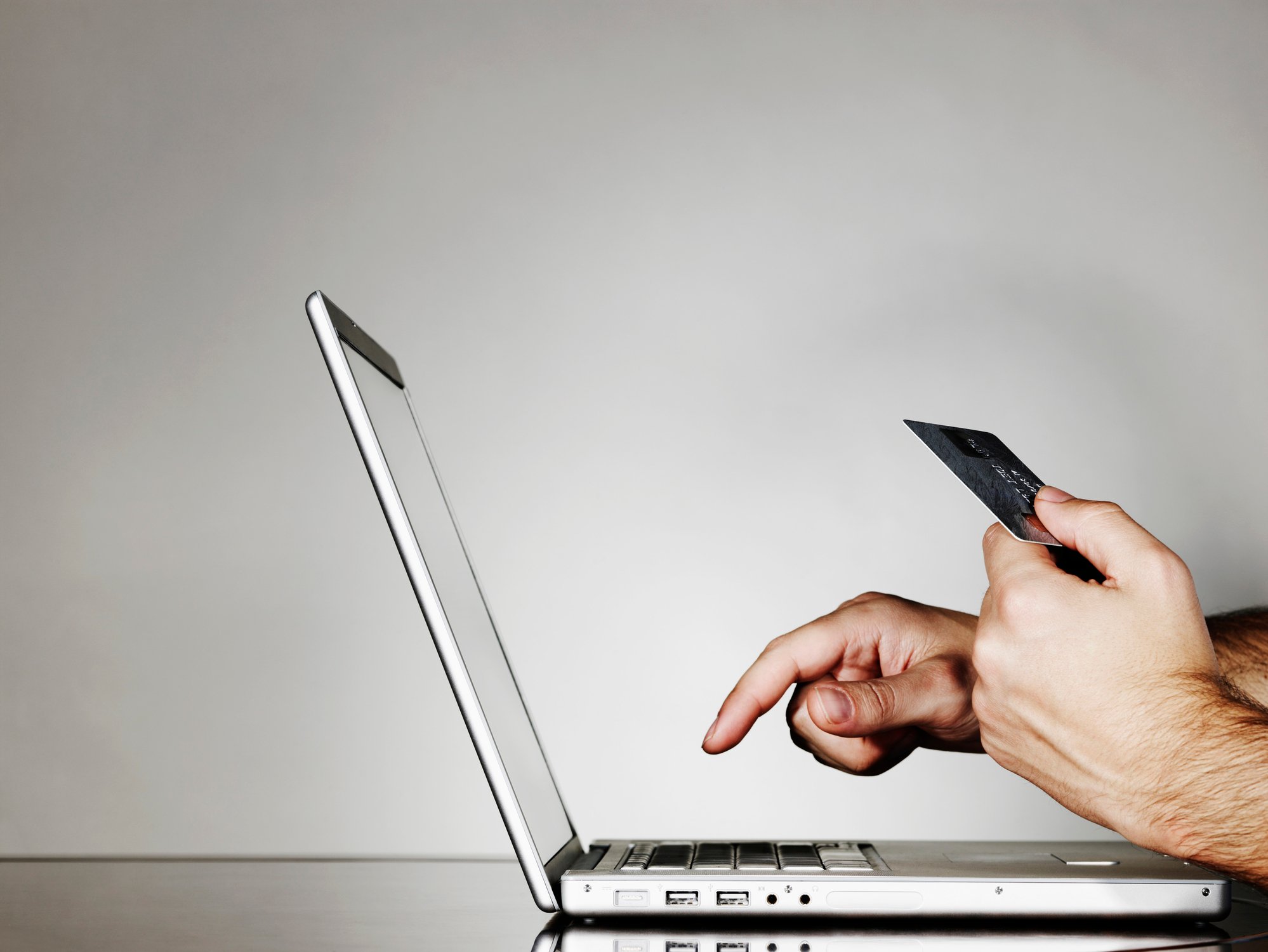 A person shopping online on a computer. 