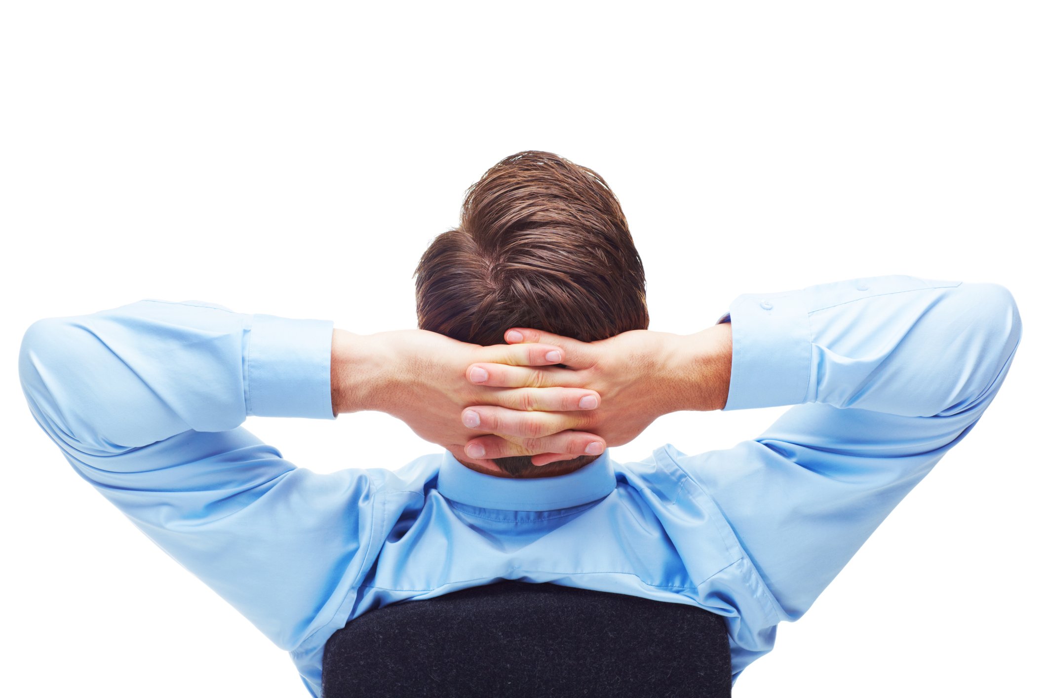 Person leaning back in a chair, relaxed, with hands behind their head.