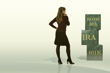 Woman staring at account blocks.