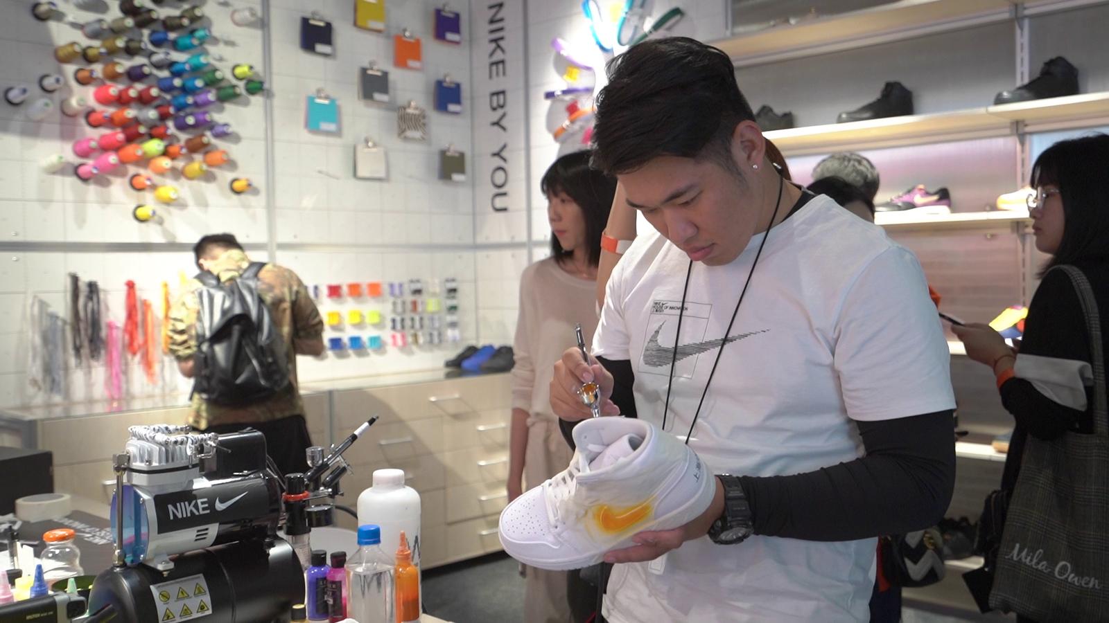 An employee at Nike's House of Innovation in Shanghai