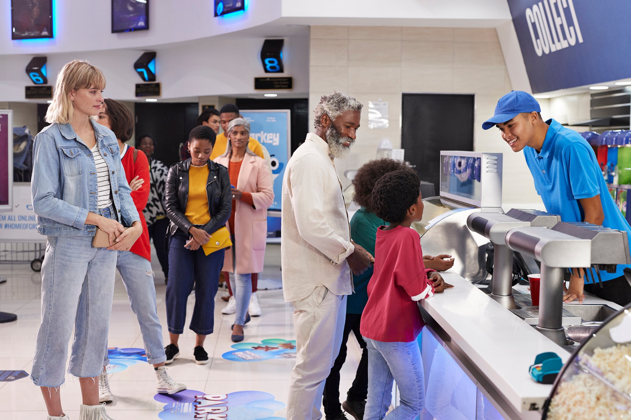 Customers ordering food and drinks.